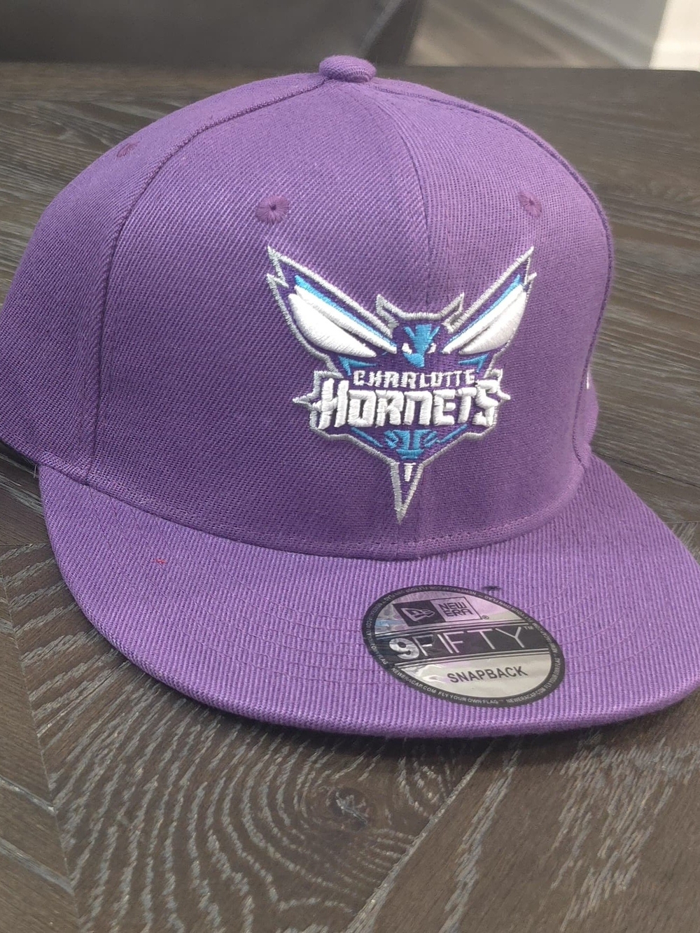 New Era Charlotte Hornets Purple Snapback Cap with Team Logo